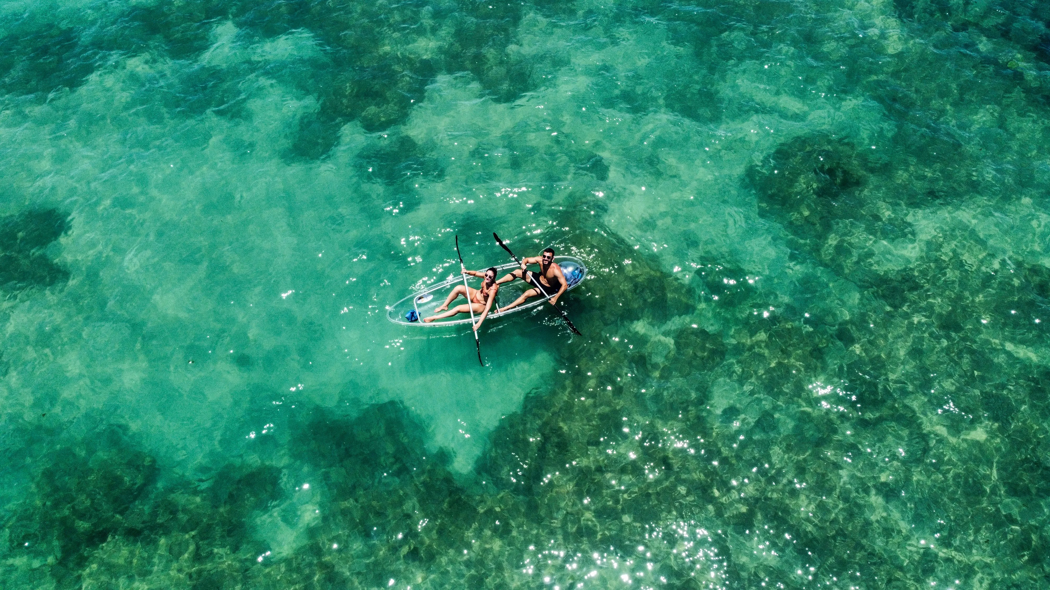 Remada Transparente Maceió — caiaque transparente sobre o mar cristalino